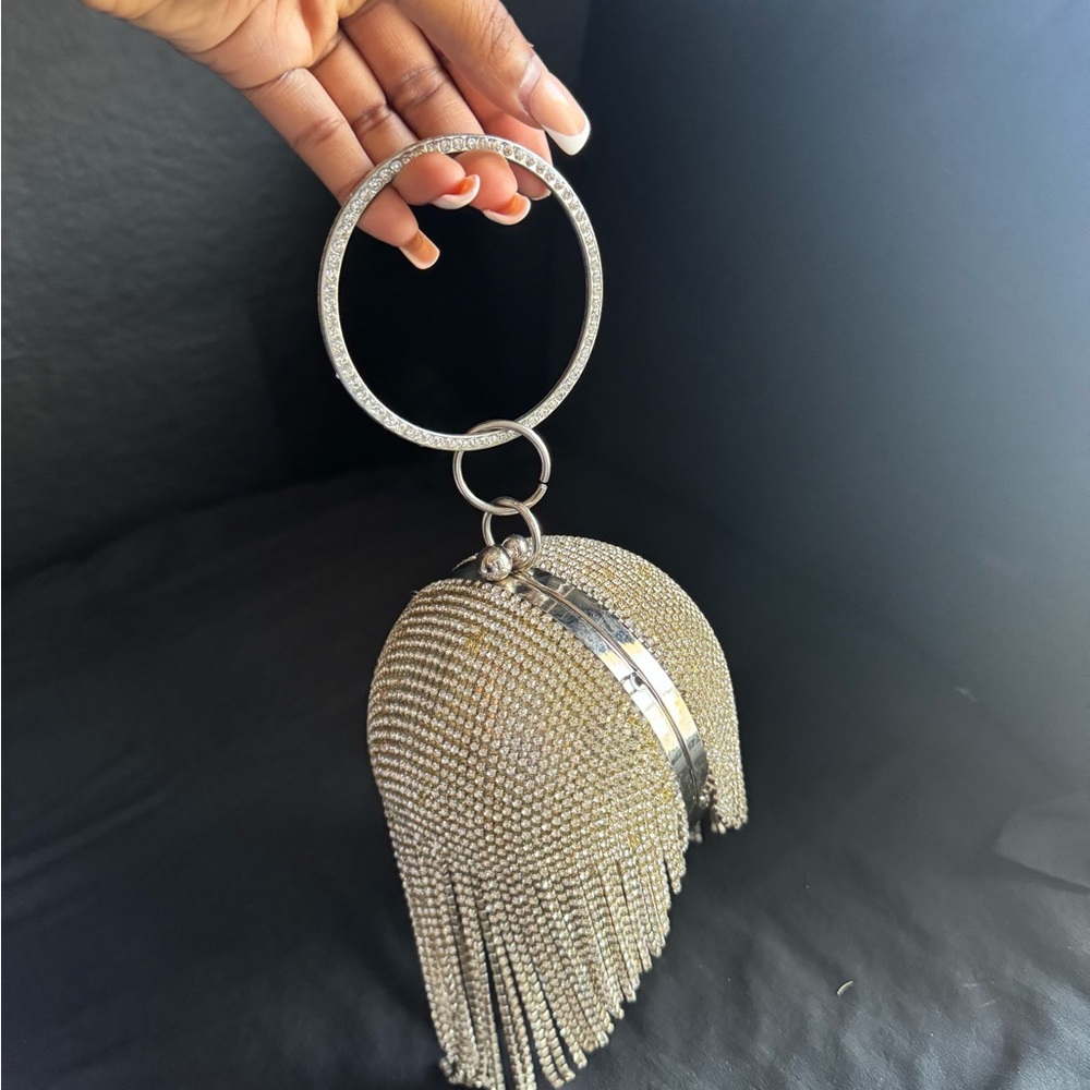 Fashionova gold and silver ball clutch